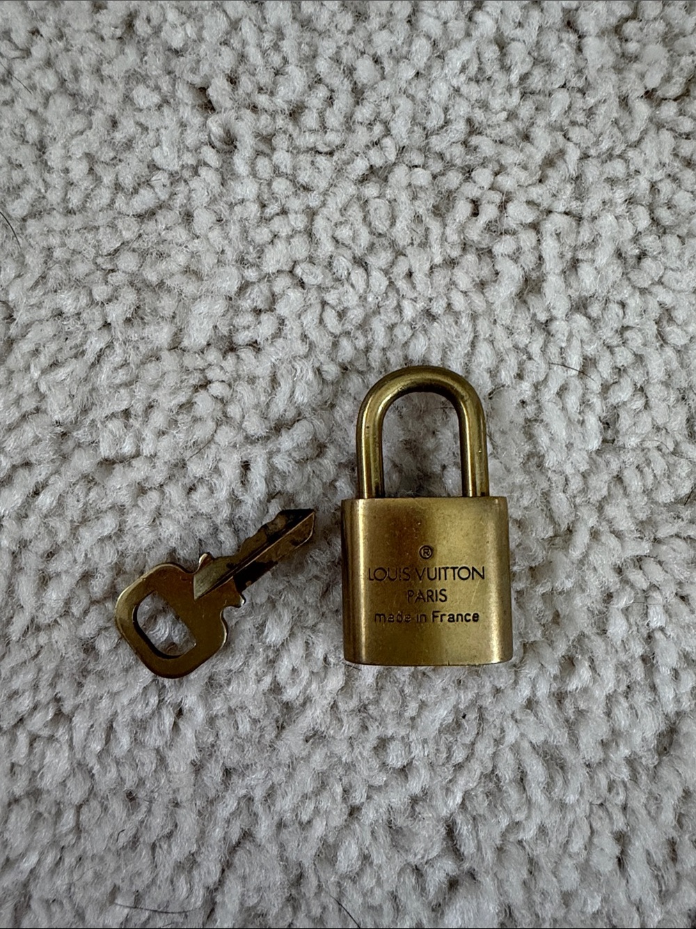 Louis Vuitton Gold Lock